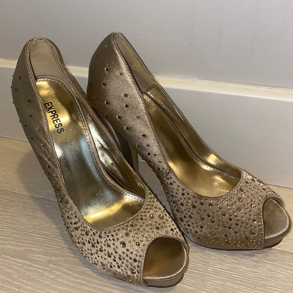 Express high heel shoes in champagne and gold. Size 7.5